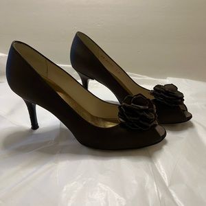 Stuart Weitzman Satin Peep-Toe Pumps.
